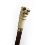 λ A GEORGE VI IVORY HANDLED WALKING CANE C.1946 carved in the form of a bulldog's head, possibly