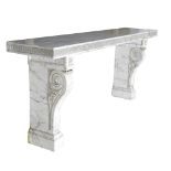 A FRENCH MARBLE CONSOLE TABLE c.1840 the rectangular top with an overlapping rondel carved edge,