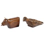 A RARE TREEN COW SNUFF BOX 19TH CENTURY with a red painted tongue and a double swivel and sliding