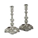 A PAIR OF 18TH CENTURY DUTCH PEWTER CANDLESTICKS C.1750 of seamed construction, with an urn shape