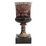 A DERBYSHIRE BLUE JOHN URN EARLY 19TH CENTURY of campana shape, on an Ashford black marble plinth