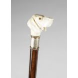 λ A FRENCH AUTOMATON IVORY HANDLED WALKING CANE C.1870 carved with a dog's head with an