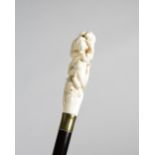 λ A JAPANESE IVORY HANDLED WALKING CANE MEIJI 1868-1912 carved with four monkeys clambering on