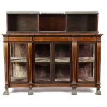 λ A LATE REGENCY ROSEWOOD BREAKFRONT SIDE CABINET EARLY 19TH CENTURY inlaid with boxwood banding,