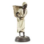 A COLD PAINTED SPELTER ORIENTALIST FIGURE OF A MOOR AFTER LOUIS HOTTOT (FRENCH 1829-1905) the