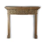 A CARVED PINE FIRE SURROUND / CHIMNEY PIECE IN ADAM STYLE LATE 19TH CENTURY the breakfront mantel