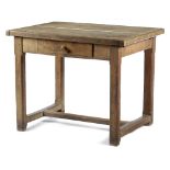 A BEECHWOOD SIDE TABLE 19TH CENTURY the boarded top with cleated ends, above a frieze drawer, on '