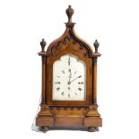 A BURR OAK GOTHIC REVIVAL CHIMING BRACKET CLOCK BY BARNARD OF LONDON, C.1825-30 the brass three