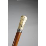 λ A FINE CHARLES II IVORY AND PIQUE WORK HANDLED WALKING CANE C.1669 the top of the handle with