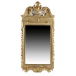 A GEORGE II GILTWOOD WALL MIRROR C.1730 the later rectangular bevelled plate within a baton and bead