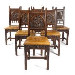 A SET OF SIX OAK GOTHIC REVIVAL DINING CHAIRS SECOND HALF 19TH CENTURY each with a crenellated top