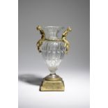 A FRENCH CUT-GLASS AND ORMOLU MOUNTED VASE LATE 19TH CENTURY the fluted and lobed urn shape glass