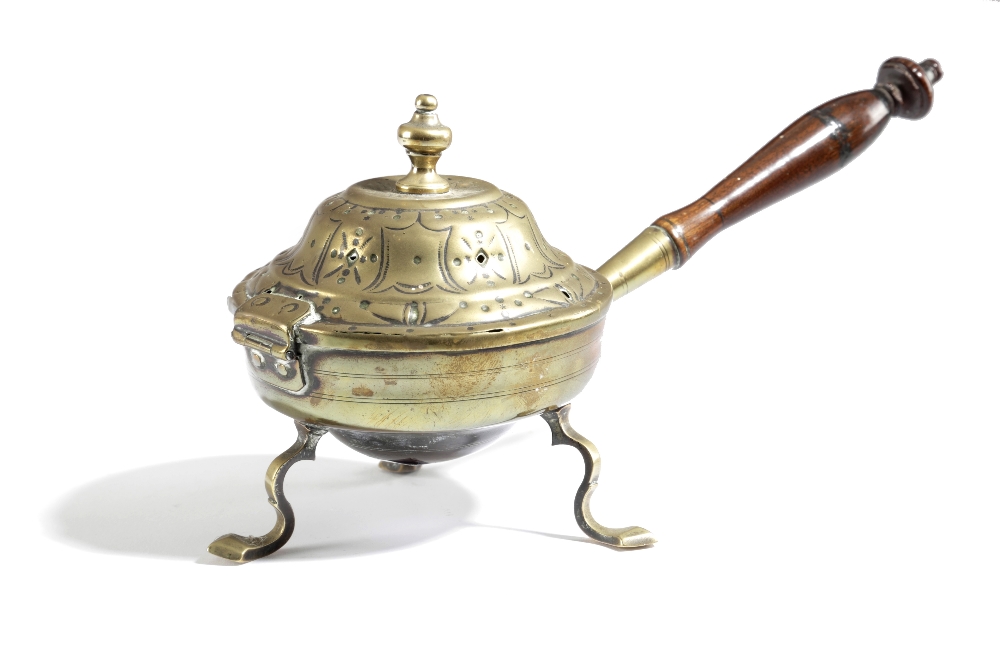 AN 18TH CENTURY BRASS BURNER OR WARMER POSSIBLY DUTCH, C.1740 the hinged pierced lid decorated