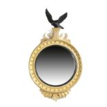 A LARGE GILTWOOD CONVEX WALL MIRROR IN REGENCY STYLE LATE 20TH CENTURY the circular plate within