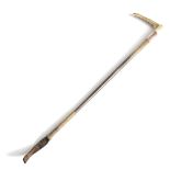 λ AN EDWARDIAN RHINOCEROS HORN RIDING CROP C.1900 the antler handle above a gold collar,