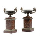 A PAIR OF FRENCH LOUIS PHILIPPE BRONZE TAZZE C.1835 each with a pair of lappets and rosette scroll