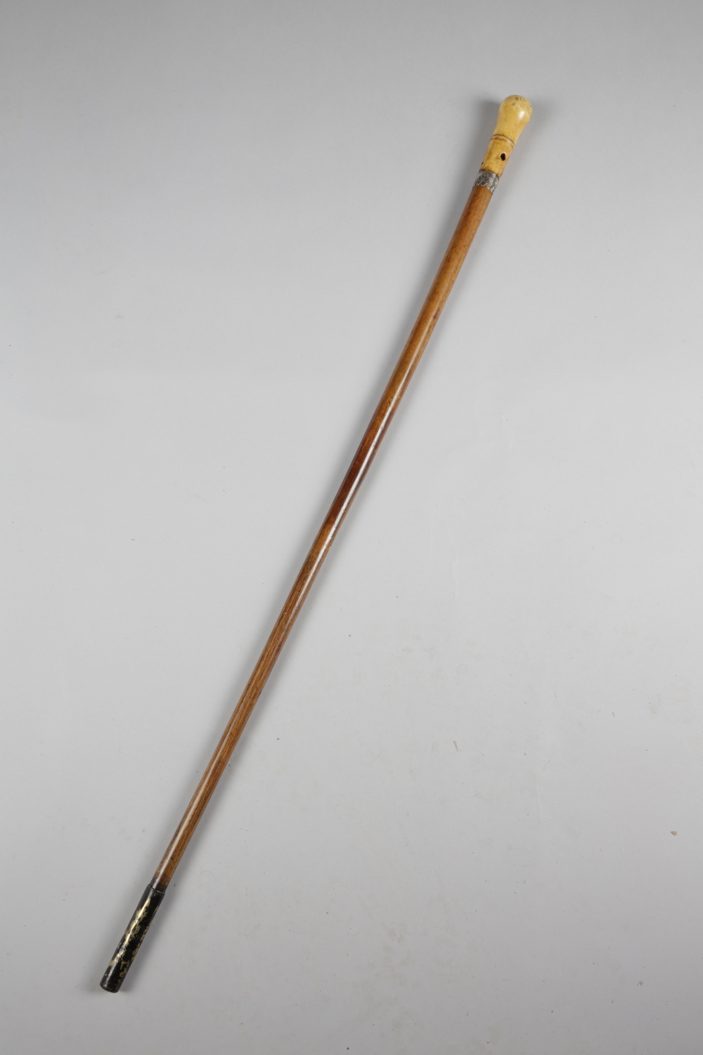 λ AN IVORY AND PIQUE WORK HANDLED WALKING CANE; LATE 17TH / EARLY 18TH CENTURY pierced for tassel,