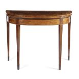 λ A LATE GEORGE III MAHOGANY CARD TABLE C.1800-10 inlaid with boxwood and ebonised stringing, the '