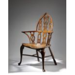 A YEW AND ELM GOTHIC WINDSOR ARMCHAIR THAMES VALLEY, 18TH CENTURY AND LATER the lancet shape back
