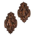A PAIR OF BLACK FOREST LINDEN WOOD HUNTING TROPHY PLAQUES LATE 19TH CENTURY carved with dead game,