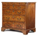 A GEORGE II WALNUT CHEST C.1730-40 the caddy moulded top quarter veneered with cross and feather