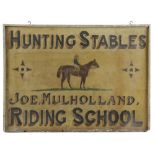 A PAINTED PINE RIDING SCHOOL SIGN LATE 19TH / EARLY 20TH CENTURY painted with a jockey on a horse