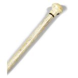 A SAILOR'S WHALEBONE WALKING CANE LATE 19TH CENTURY with a walrus ivory pommel handle, above a