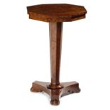 A WILLIAM IV BURR YEW LAMP TABLE C.1830 the octagonal fixed top on a tapering stem and a triform