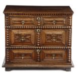 A WILLIAM AND MARY OAK CHEST C.1690 the top with a moulded edge, above three long drawers with
