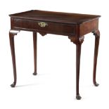 A GEORGE II MAHOGANY SILVER TABLE C.1740 the dished top with cusped corners, above a frieze drawer