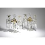 A PAIR OF CUT-GLASS AND GILT BRASS TWIN-LIGHT CANDELABRA C.1820 each with a swirl nozzle and a