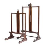 TWO MAHOGANY GALLERY TABLE EASELS 20TH CENTURY each with a sliding adjustable support, on sleigh