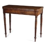 A REGENCY MAHOGANY CARD TABLE C.1810 the 'D' shape fold-over top on twin gate supports, with ring