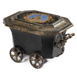 AN EARLY VICTORIAN JAPANNED TOLE COAL WAGON C.1850 the hinged lid gilt decorated with bands of