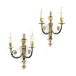 A SET OF FOUR GILT BRASS AND EBONISED TWIN-LIGHT WALL LIGHTS IN 18TH CENTURY STYLE each with a