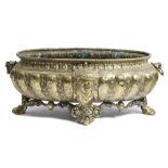 A DUTCH BRASS OVAL JARDINIERE 19TH CENTURY applied with female draped masks, with a lobed body,