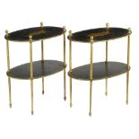A PAIR OF EBONISED AND PARCEL GILT OVAL OCCASIONAL TABLES IN REGENCY PENWORK STYLE with two tiers,