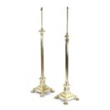 TWO BRASS CORINTHIAN COLUMN STANDARD LAMPS LATE 19TH CENTURY each with an adjustable light