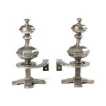 A PAIR OF STEEL ANDIRONS IN 17TH CENTURY STYLE with brass spiral twist mounts, each with a turned