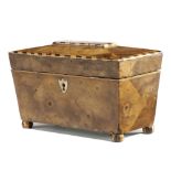 A REGENCY WALNUT MINIATURE CADDY EARLY 19TH CENTURY of sarcophagus form, with segmented oyster