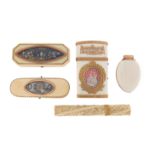 A collection of ivory items, including a French late 18th century long oval ivory patch box,