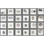 A box containing thirty-three assorted grey cultured and natural pearls, 165.84cts total Random test