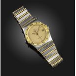 A steel and gold Constellation wristwatch by Omega, the signed dial with date aperture at 3 and