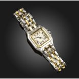 A lady's Panthere steel and gold wristwatch by Cartier, the signed dial with black Roman numerals,