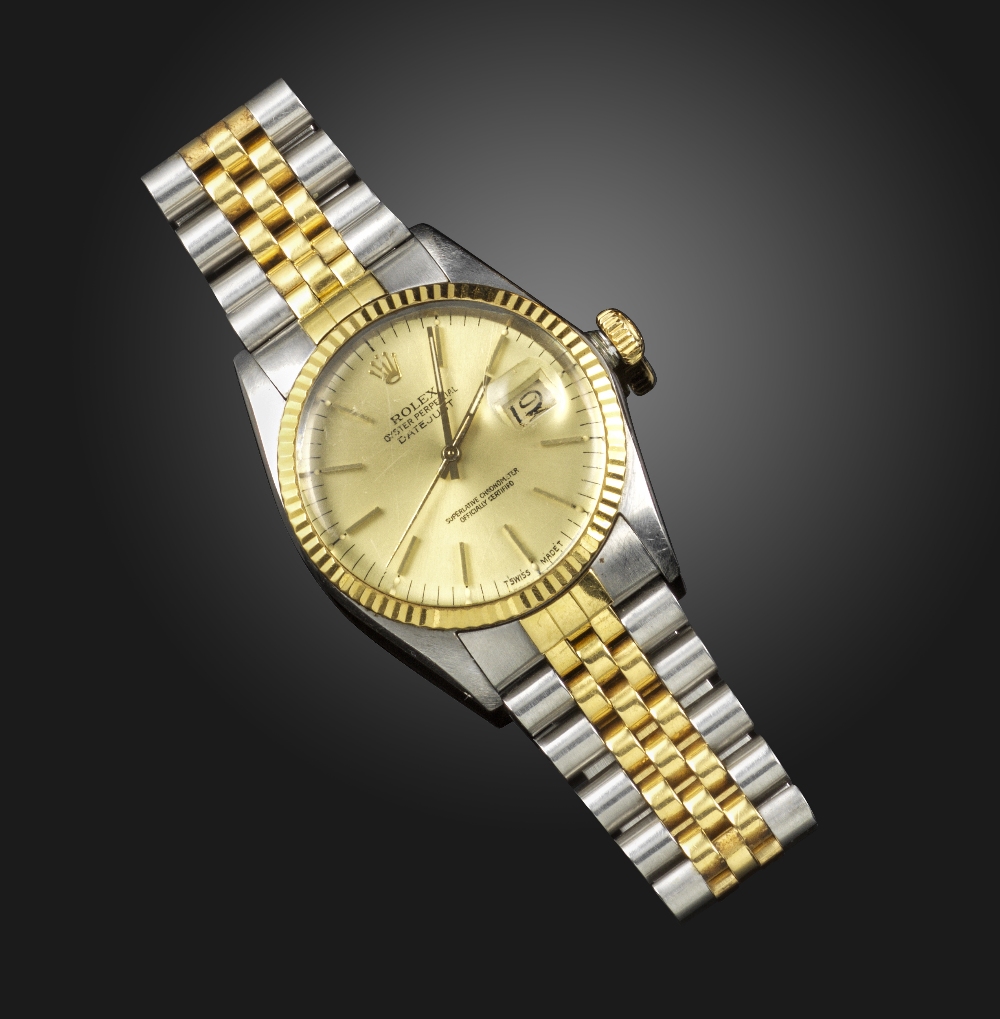 An Oyster Perpetual Datejust steel and gold wristwatch by Rolex, the signed dial with baton numerals