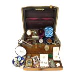 A large jewellery casket in a leather bound case containing a large selection of jewellery