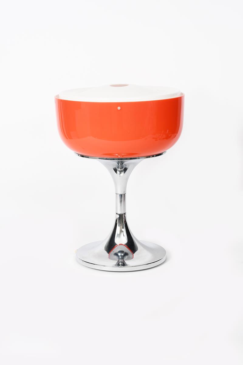 An I Guzzini acrylic and chrome table lamp designed by Harvey Guzzini, orange acrylic shade with