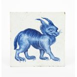 A William De Morgan Late Fulham Period Lynx tile, painted with a lynx creature walking, in blue on a