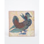 A William De Morgan Late Fulham Period triple lustre tile, painted with a guinea fowl bird
