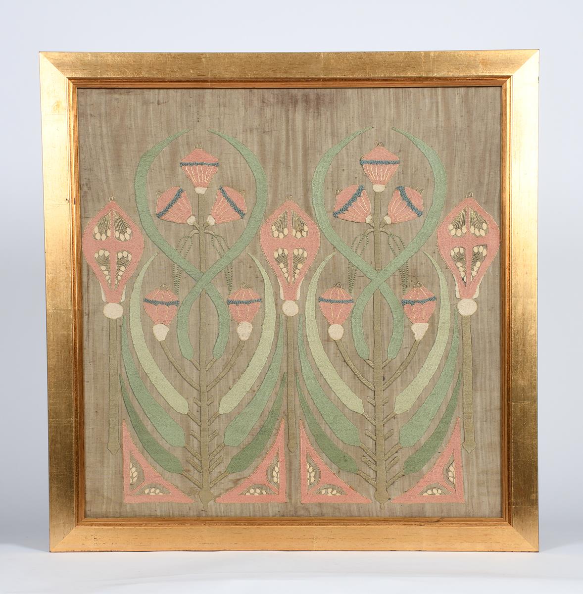 An Art Nouveau silk embroidered panel, decorated with stylised flower stems in pink and green silks, - Image 2 of 2